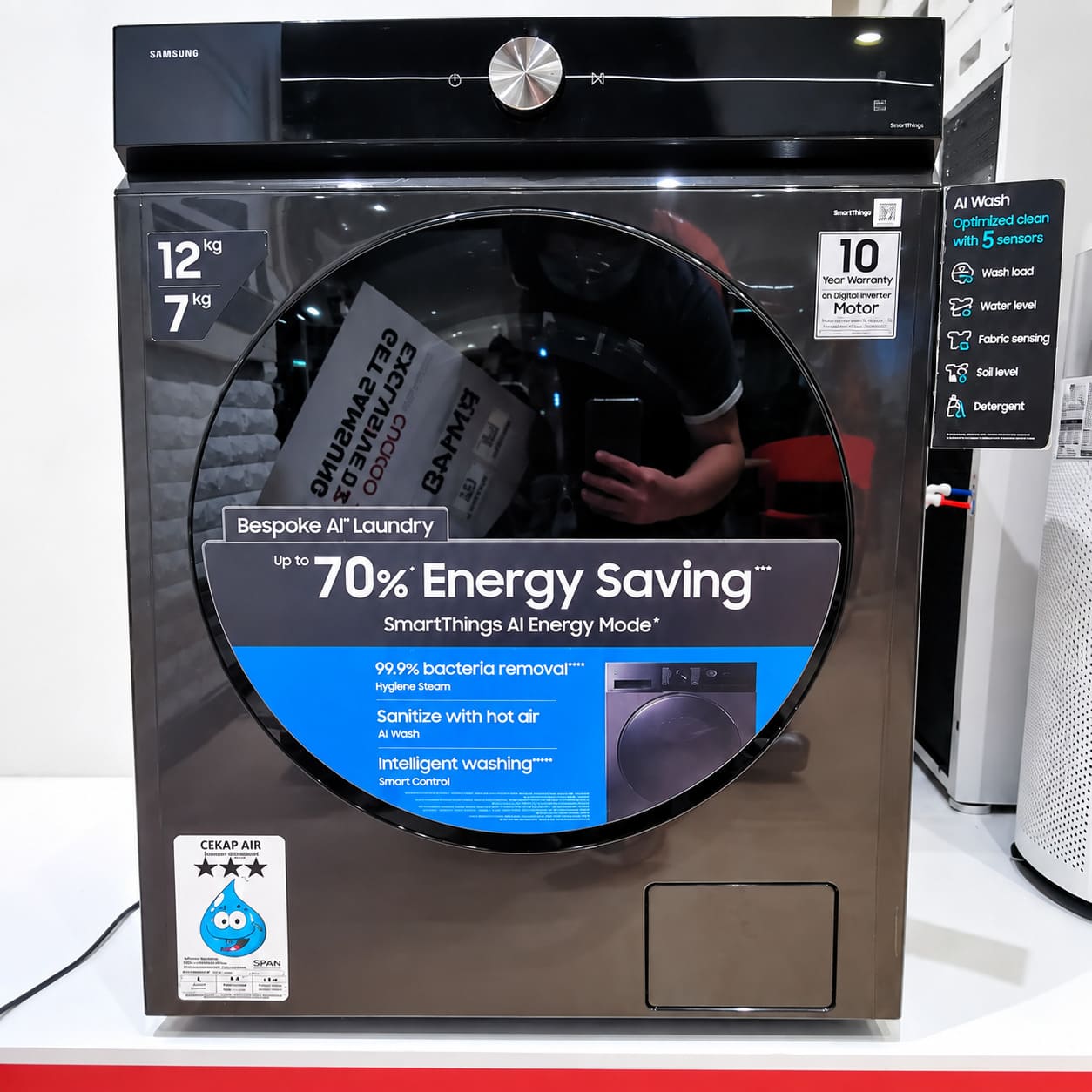 Samsung front-loading laundry appliance displayed at the Sunway Putra Mall brandstore